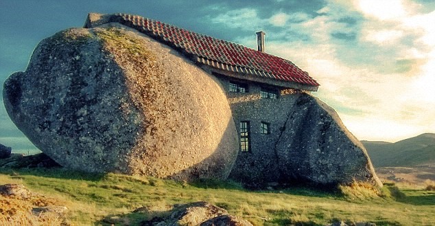 house between 2 rocks