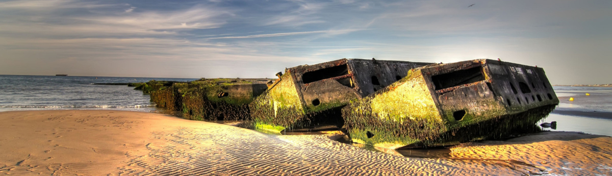 normandy beach with allied equipment